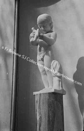 IN THE SULPTURE GALLERY BOY WITH BIRD